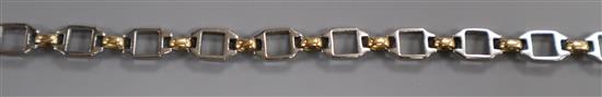 A Cartier steel and yellow metal bracelet with box and certificate, (later replaced 9ct clasp), approx. 18cm.
